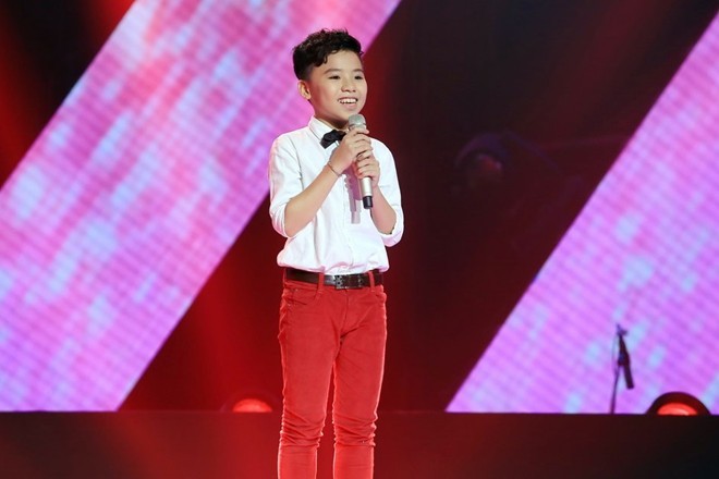 Cạu bé The Voice Kids lón len tù gánh hàng rong